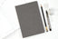 A selection of gifts for writers including notebooks and pens.
