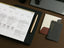 Stationery on a brown desk