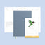 Gray notebook with a calendar featuring a green bird illustration on a light blue background