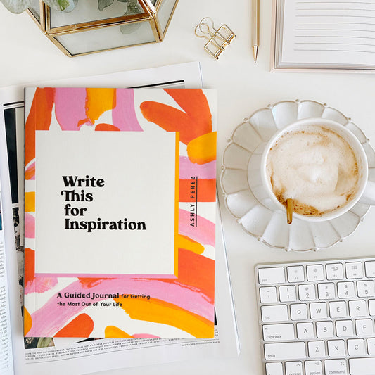 Write This for Inspiration Workbook on table