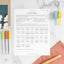 Riley Sheehey's creativity challenge worksheet on a marble tabletop next to markers and colorful washi tape.