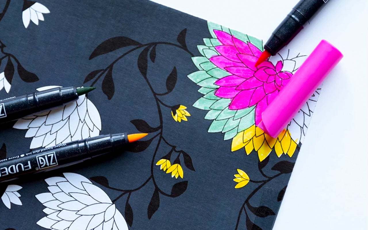 Brush pens have partially colored in a flower