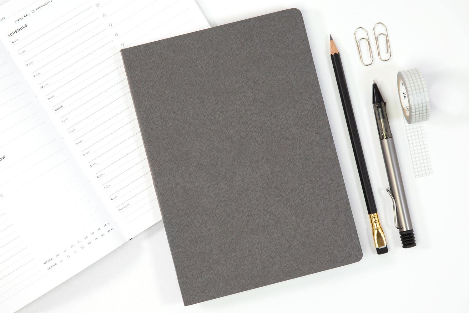 A selection of gifts for writers including notebooks and pens.