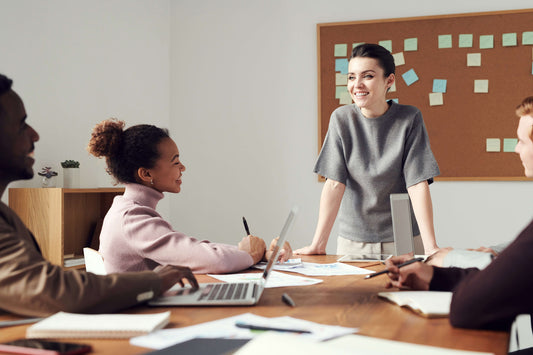 woman leading a team at a meeting