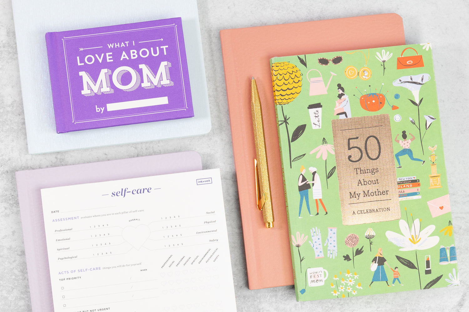 A colorful array of mother's day gifts, including books and notepads.