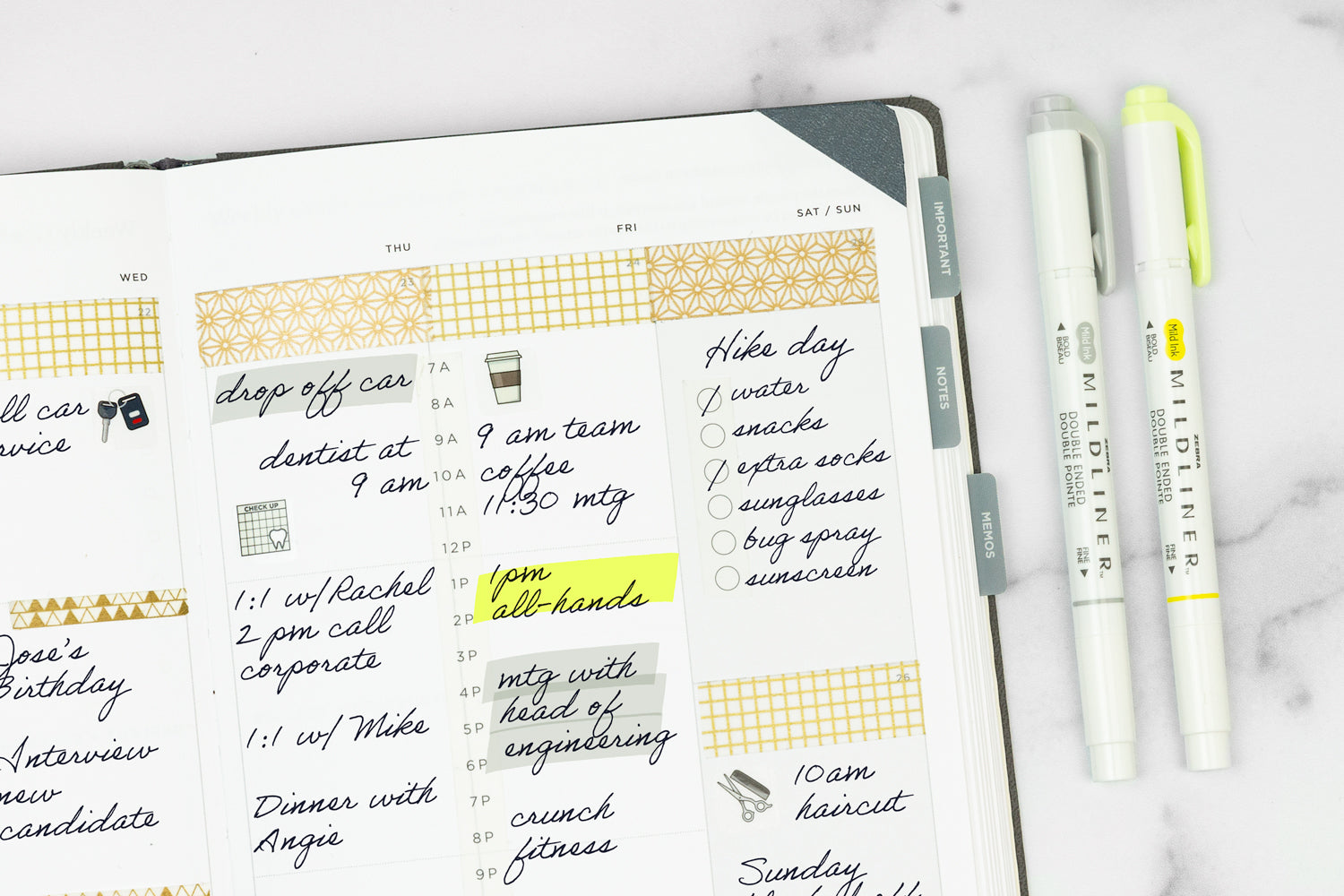 A planner open to a weekly planning page filled with a busy schedule
