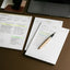 bestseller noetpad bundle filled out on a desk