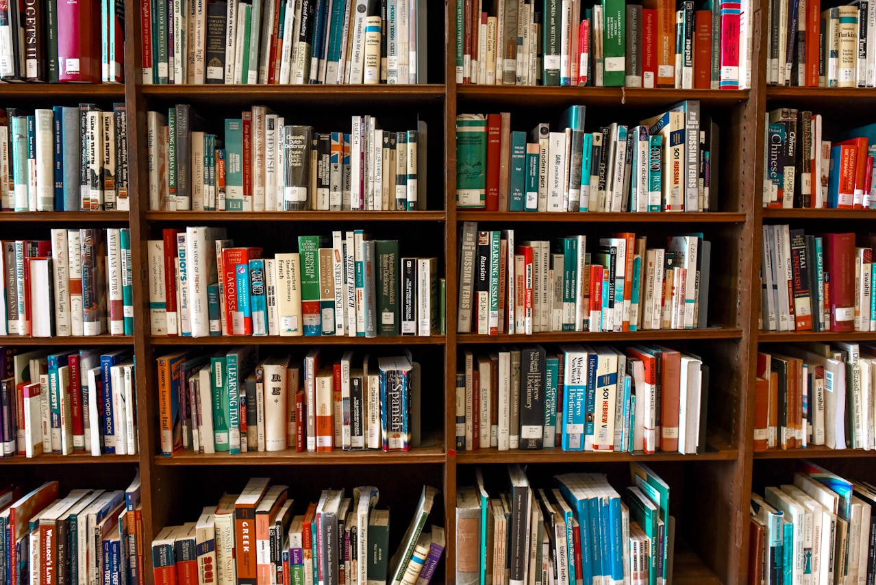 Several shelves full of colorful books