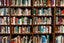 Several shelves full of colorful books