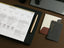 Stationery on a brown desk