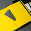 notebook with a pocket on the back