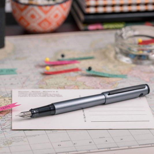 Pilot Explorer Fountain Pen grey on a map