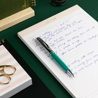 Jotter Legal Pad with Pelikan pen writing