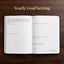 An open yearly goal setting planner or notebook lies flat on a dark wood background, with the title 'Yearly Goal Setting' printed above it. The pages are white with black text and lined sections for goals, action plan, notes, and processes.