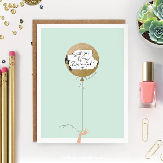 Scratch-Off Card - Mint+Gold Balloon on a desk