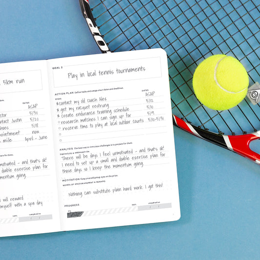 Fitness Planner with a tennis racket and ball