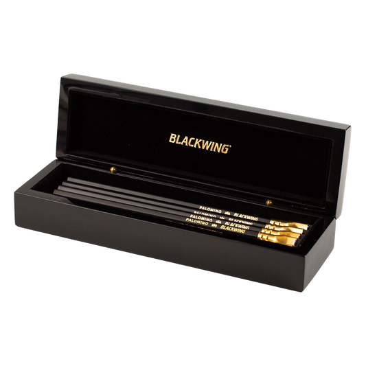 Blackwing Piano Box  The Blackwing Piano Box features a mix of 12 Blackwing  pencils in a piano inspired box that opens to reveal the Blackwing pencils  and a black velvit-lined interior.